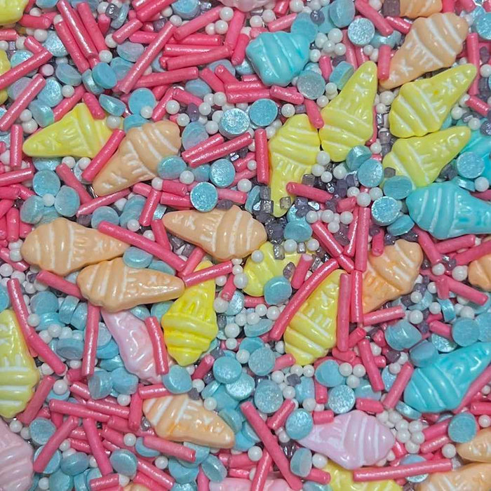 enlarged view of blue white ice cream shaped sprinkles