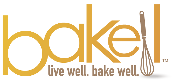 Bakell logo in gold and brown, featuring a whisk as the letter "l" and the tagline "live well. bake well.