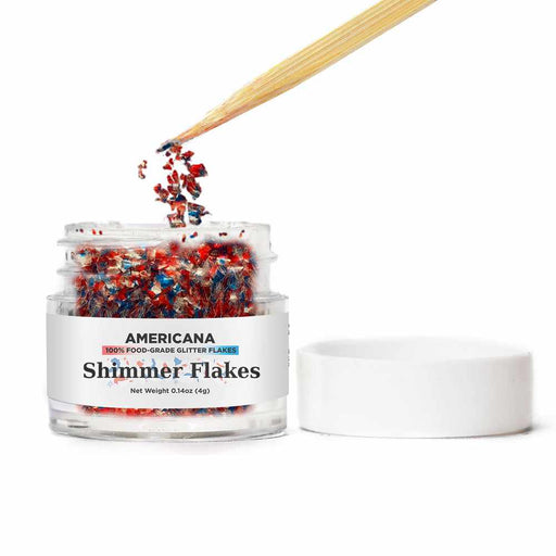 red white and blue shimmer flakes being taken out of jar near me