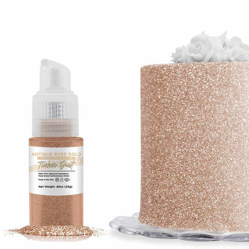 Front view of a 25 gram Antique Rose Gold Edible Glitter Spray Pump to the left, and a cake decorated with the glitter to the right. | bakell.com