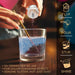 Hand pouring baby blue edible drink glitter into a glass of clear liquid with a gold straw and step-by-step instructions.