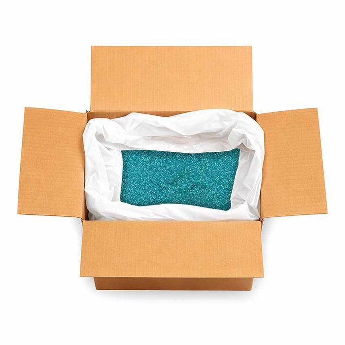 Open cardboard box with a large bag of Bermuda Blue-Green ultrafine metallic craft glitter.