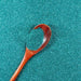 Bermuda Blue Ultrafine Metallic Craft Glitter Dazzler Dust in a wooden spoon, spread on a surface.