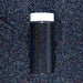 Black Magic Ultrafine Holographic Craft Glitter Dazzler Dust in a clear jar with a white cap, on a glitter background.