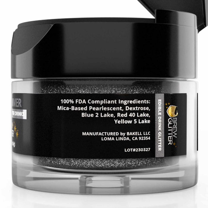 4g jar of black shimmer edible drink glitter with a black flip-top cap and ingredient label.