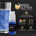 Blue Brew Glitter mini spray pump next to a glass of blue sparkling beverage.