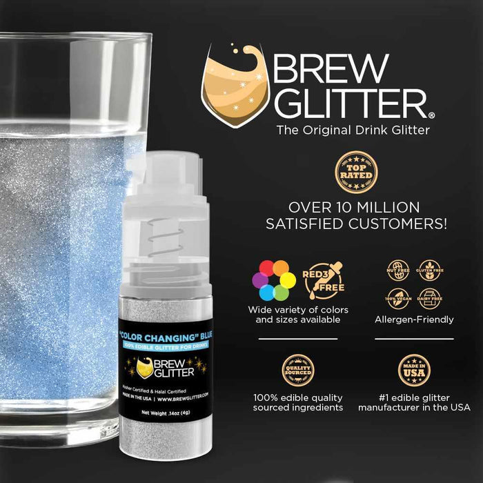Blue color-changing beverage glitter in a mini spray pump next to a glass of water.