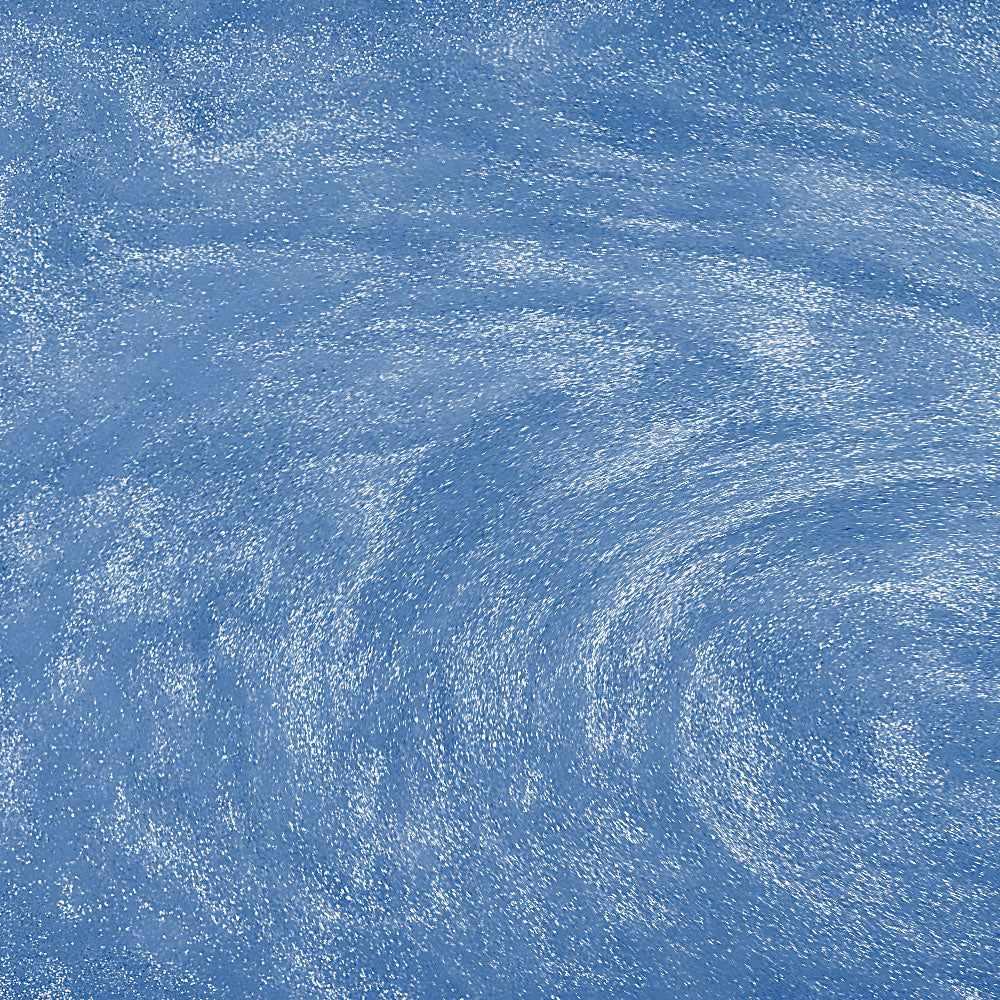 Swirling blue edible drink glitter with a high-shine metallic finish and sparkling texture in liquid.