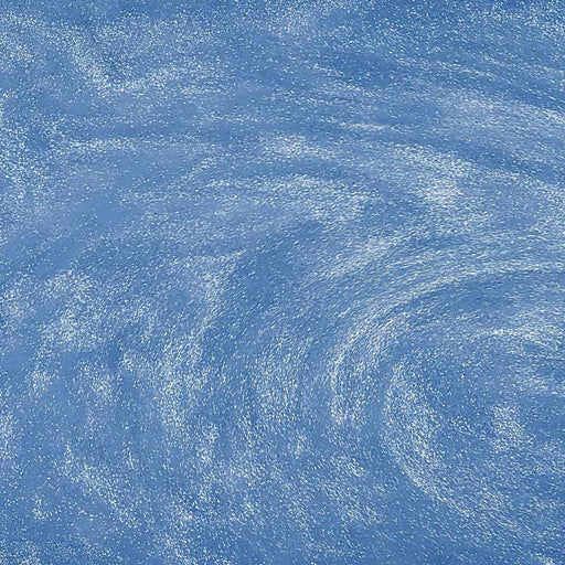 Swirling blue edible drink glitter with a high-shine metallic finish and sparkling texture in liquid.