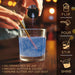 Blue edible glitter being poured from a 4g jar into a glass of water, showing a sparkling drink and usage instructions.