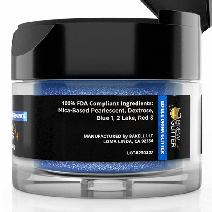 4g jar of blue edible drink glitter with a black flip-top cap and ingredient label by Brew Glitter.