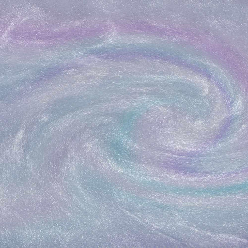 Swirling blue and purple iridescent edible glitter creating a holographic, shimmery liquid effect.