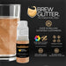 Bronze Brew Glitter mini spray pump next to a glass of sparkling bronze beverage.