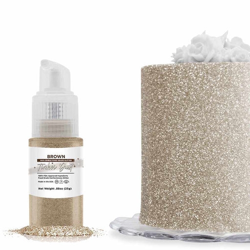 Front view of a 25 gram Brown Edible Glitter Spray Pump to the left, and a cake decorated with the glitter to the right. | bakell.com