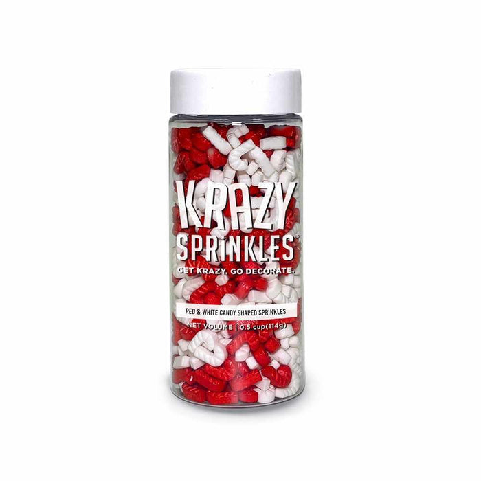 Half-cup jar of red and white candy cane shaped sprinkles by Krazy Sprinkles with a white screw-top lid.