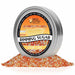 Candy Corn Rimming Sugar in a silver tin, surrounded by white, yellow, and orange sugar crystals.