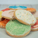 sugar cookies sprinkled with sweet sour candy powder topping