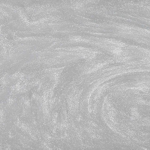 Clear edible drink glitter swirling in a liquid, creating a shimmering, metallic silver effect.