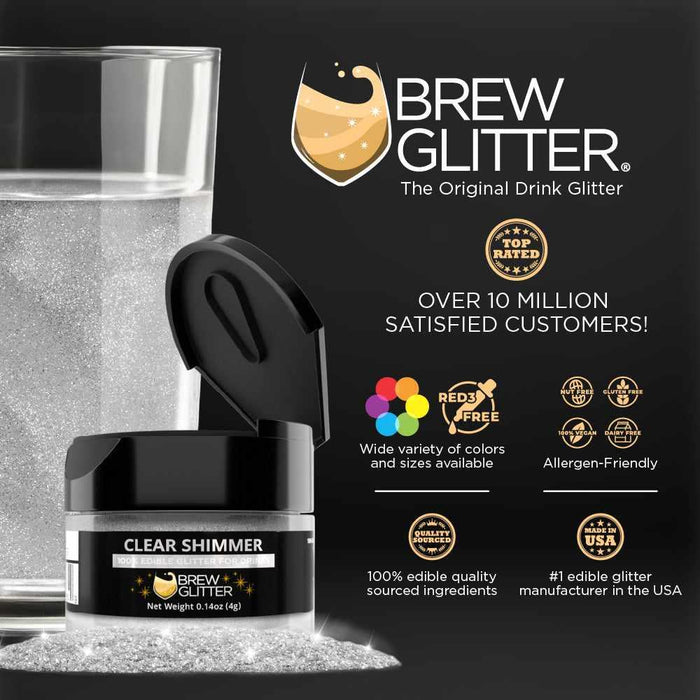 Clear shimmer edible glitter jar with black lid, next to a glass of water, on a dark surface.