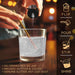 Clear shimmer edible glitter being poured from a 4g jar into a glass, showing a sparkling drink with a gold straw.