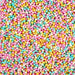 Cotton Candy Mini Sprinkle Beads: tiny round sprinkles in pink, blue, yellow, and white.
