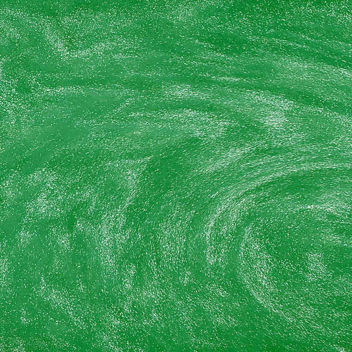 close up of green glitter drink swirls