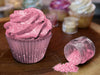 pink cupcake frosting decorated with pink edible glitter dust