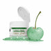 product image of green food glitter jar next to sparkling cherry