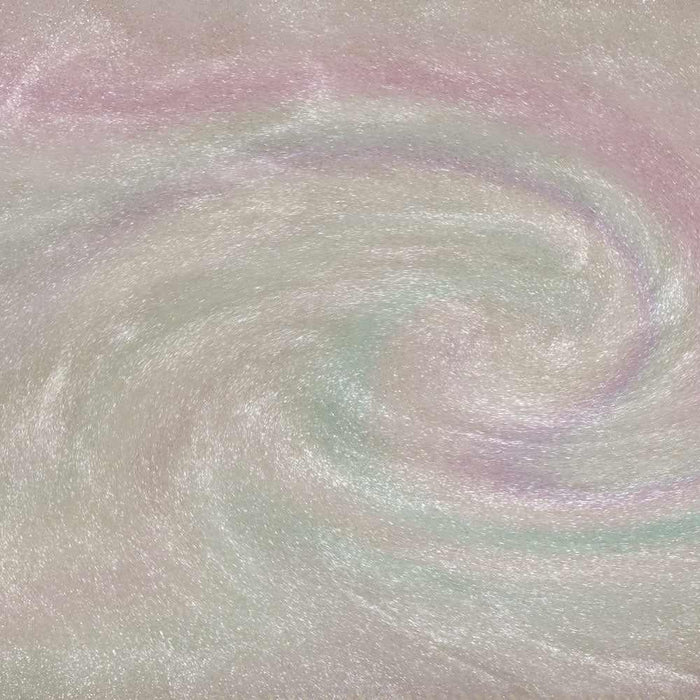 Swirling gold iridescent edible glitter with holographic rainbow highlights in a liquid base.