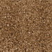 Close-up texture of shimmering gold pearl cocktail rimming sugar crystals for decorating glassware.