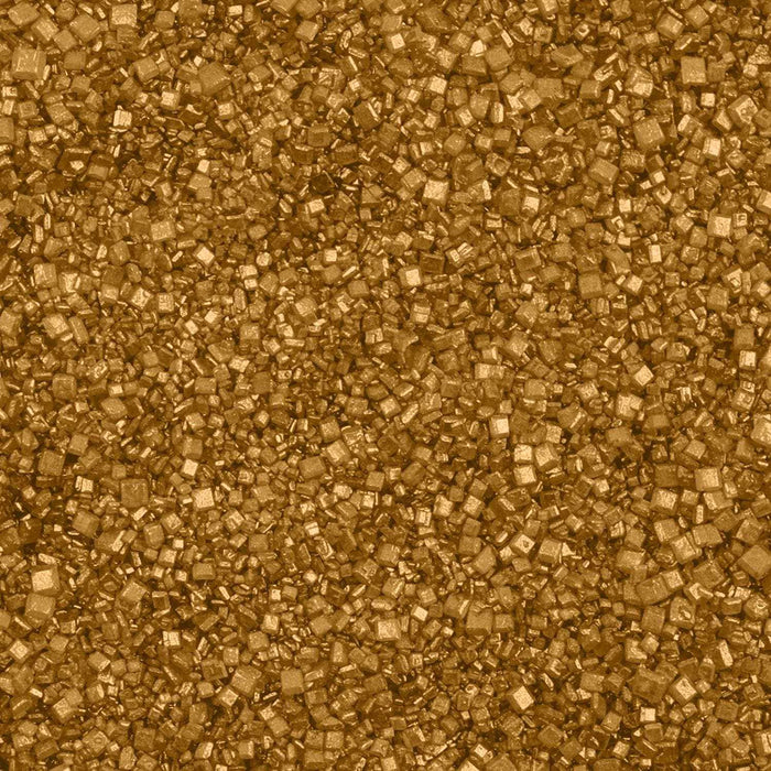 Shimmering gold pearl cocktail rimming sugar crystals with a metallic finish for garnishing glassware.