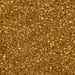 Shimmering gold pearl cocktail rimming sugar crystals with a metallic finish for garnishing glassware.