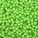 Close-up of numerous bright green 4mm sprinkle beads, ideal for wholesale.