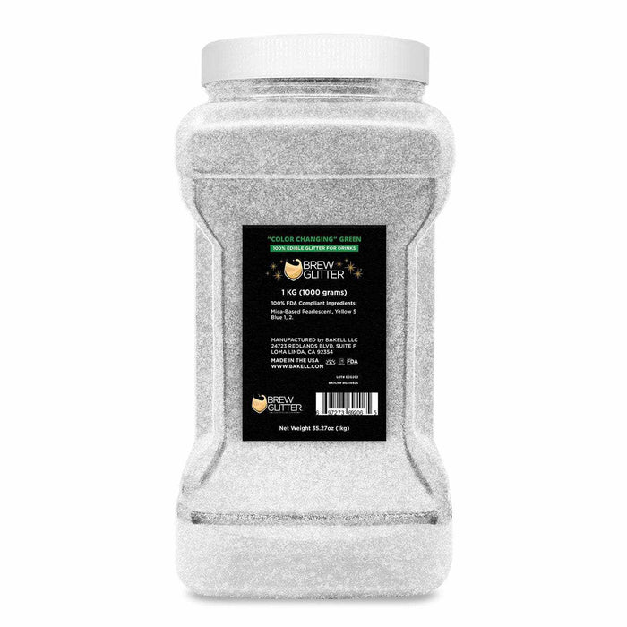 1kg bulk size of white-to-green color changing Brew Glitter in a clear plastic jar.