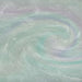 Swirling green iridescent edible glitter with holographic rainbow highlights for beverages.