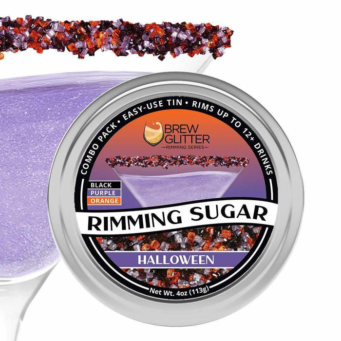 Halloween Rimming Sugar tin with black, purple, and orange sugar on a cocktail glass.