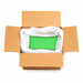 Open cardboard box filled with 132lb of vibrant Heat Green ultrafine UV reactive iridescent craft glitter.