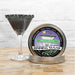 Hocus Pocus Rimming Sugar tin with green, purple, and black sugar, next to a martini glass with a black sugar rim.