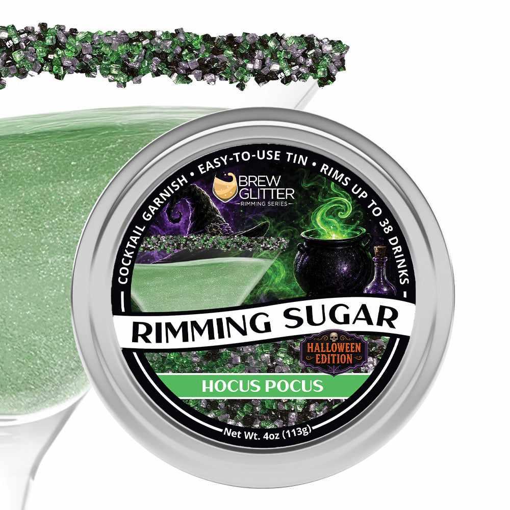 Hocus Pocus Halloween cocktail rimming sugar in a 4oz tin with purple and green sugar crystals on a glass rim.
