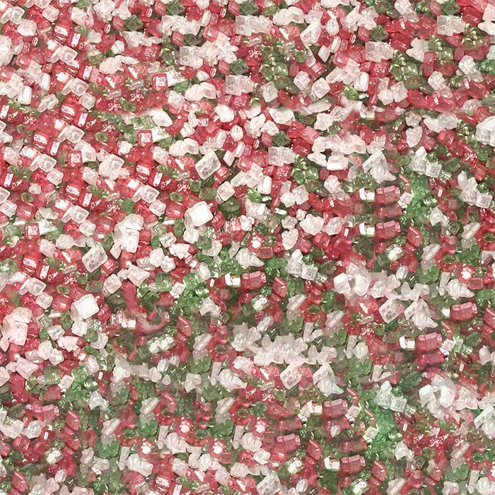 Close-up of sparkling red, green, and white holiday rimming sugar crystals.