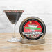 Holiday Rimming Sugar tin with red, green, and white sprinkles, next to a martini glass garnished with the sugar.