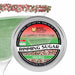 Holiday Rimming Sugar tin with red, green, and white sugar on a glass rim.