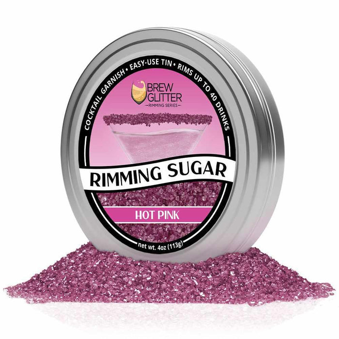 Hot pink rimming sugar in a 4oz tin, with a pile of sugar crystals at its base.