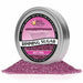 Hot pink rimming sugar in a 4oz tin, with a pile of sugar crystals at its base.