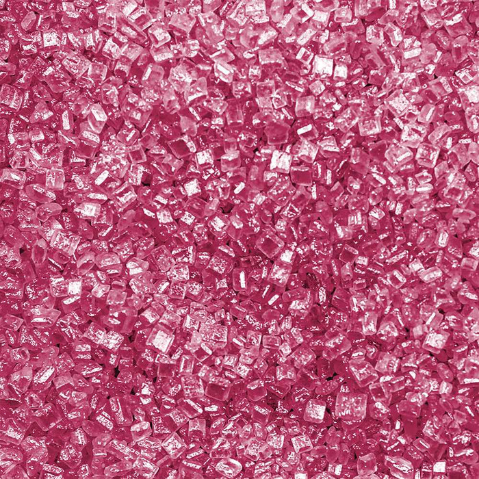 Close-up of sparkling hot pink rimming sugar crystals, perfect for garnishing drinks.