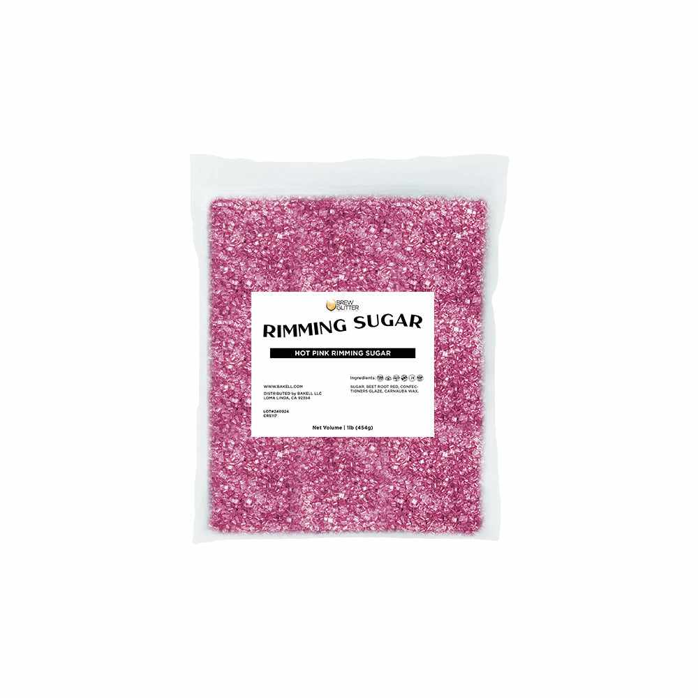 One-pound bag of vibrant hot pink cocktail rimming sugar with a white product label on a clear plastic pouch.