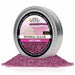 4oz tin of hot pink cocktail rimming sugar with a branded label and a pile of vibrant pink sugar crystals below.