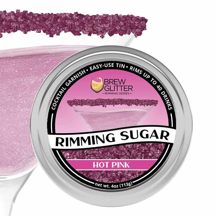 Brew Glitter Hot Pink Rimming Sugar tin with a martini glass rimmed with vibrant pink sugar crystals.