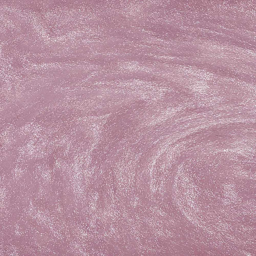 Swirling light pink edible glitter with a shimmering, metallic texture for drinks and desserts.