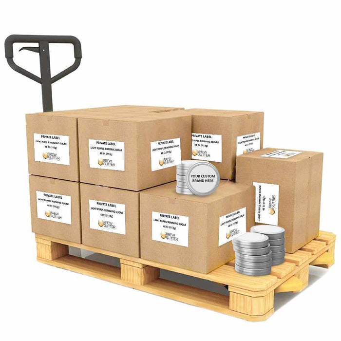 Wholesale pallet of light purple rimming sugar in 4oz tins with branded shipping boxes and a manual pallet jack.
